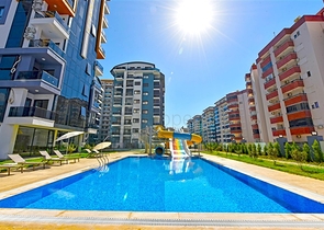 شقة حديثة 1 + 1 للإيجار-الراحة والبنية التحتية في وسط محمودلار