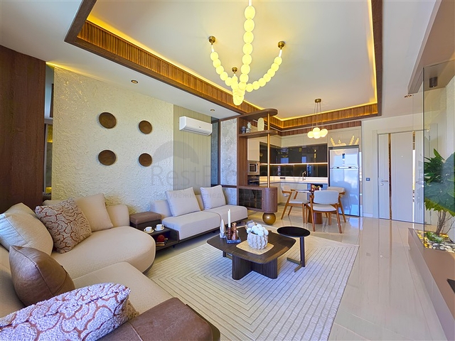 شقق حديثة 1 + 1 في مجمع مرموق على البحر في توركلر