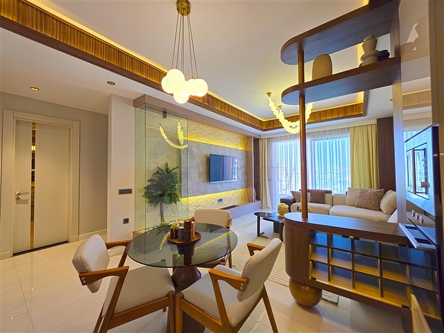 شقق حديثة 1 + 1 في مجمع مرموق على البحر في توركلر