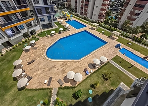 استئجار شقة مريحة 1 + 1 مع بنية تحتية غنية في قلب محمودلار