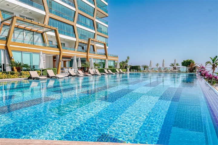 شقة مطلة على البحر في مجمع سكني ببنية تحتية متميزة شقة مطلة على البحر في مجمع سكني ببنية تحتية متميزة