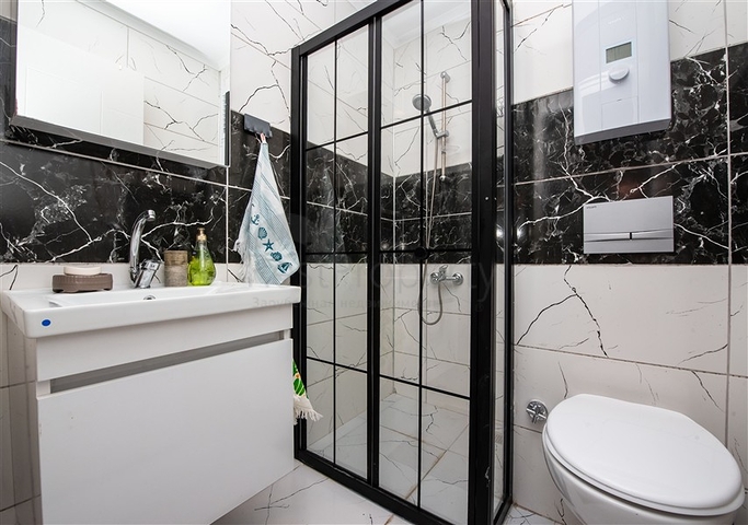 شقة مريحة مفروشة 1 + 1 في مجمع حديث مع بنية تحتية على مستوى المنتجع