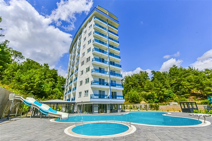 شقة مريحة مفروشة 1 + 1 في مجمع حديث مع بنية تحتية على مستوى المنتجع