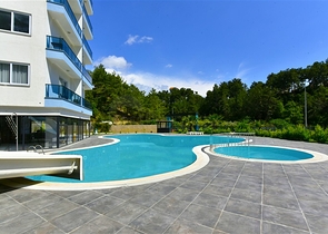 شقة مريحة مفروشة 1 + 1 في مجمع حديث مع بنية تحتية على مستوى المنتجع