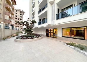 شقة حديثة 1 + 1 في مجمع جديد مطل على البحر في وسط ألانيا