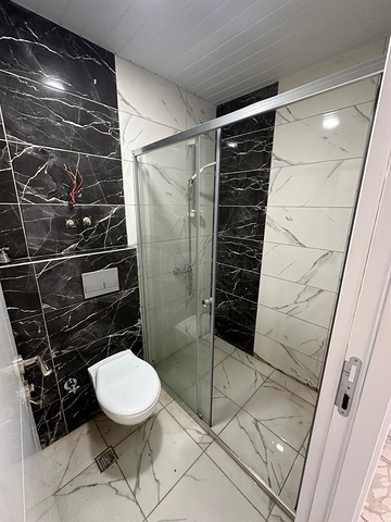 شقة مودرن 1 + 1 مطلة على البحر في دميرتاش