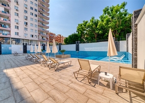 شقة حديثة 1 + 1 في مجمع جديد في محمودلار ، على بعد 350 متر فقط من البحر