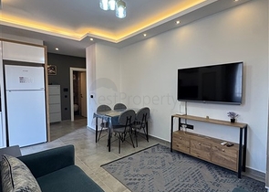 شقة حديثة 1 + 1 في مجمع جديد في محمودلار ، على بعد 350 متر فقط من البحر