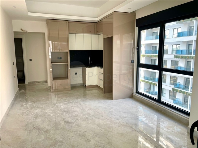 شقة حديثة 1 + 1 في مجمع جديد مع حمام سباحة ومنطقة سبا في محمودلار