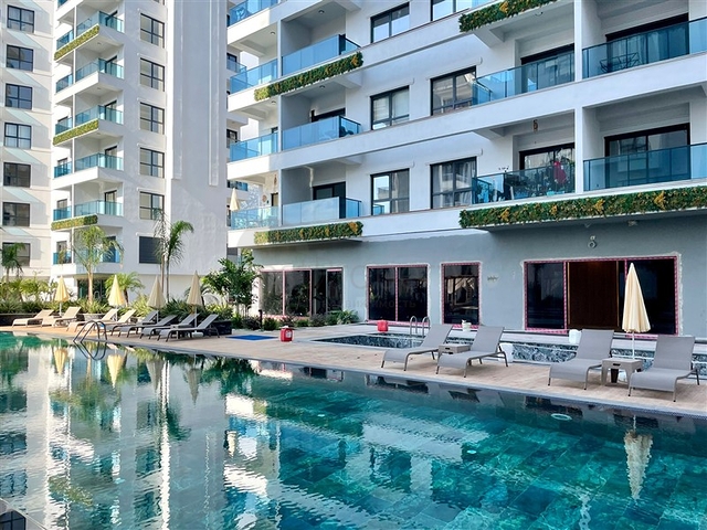 شقة حديثة 1 + 1 في مجمع جديد مع حمام سباحة ومنطقة سبا في محمودلار