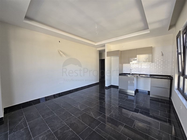 شقة 1+1 مطلة على البحر وبنية تحتية غنية في محمودلار