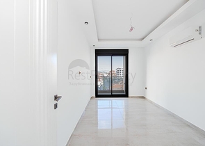 شقة حديثة 1 + 1 في مبنى جديد في حي كليوباترا